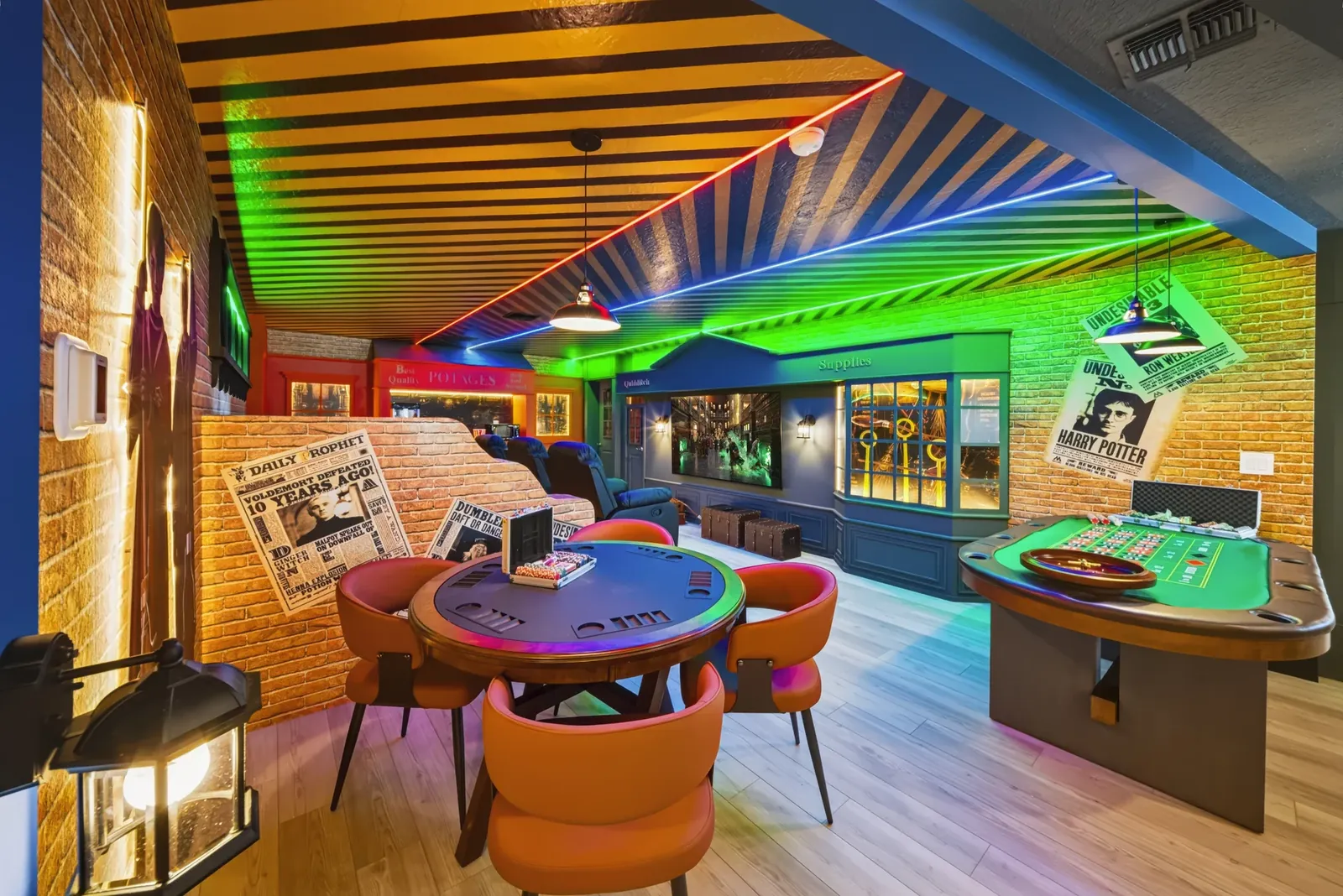 Themed game room with neon ceiling lights, poker and roulette tables